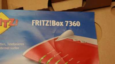 RITZ!Box 7360 Router im Set mit Zubehör und Originalverpackung.